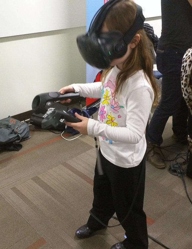 Girl Scouts participating in a virtual reality STEM outreach event